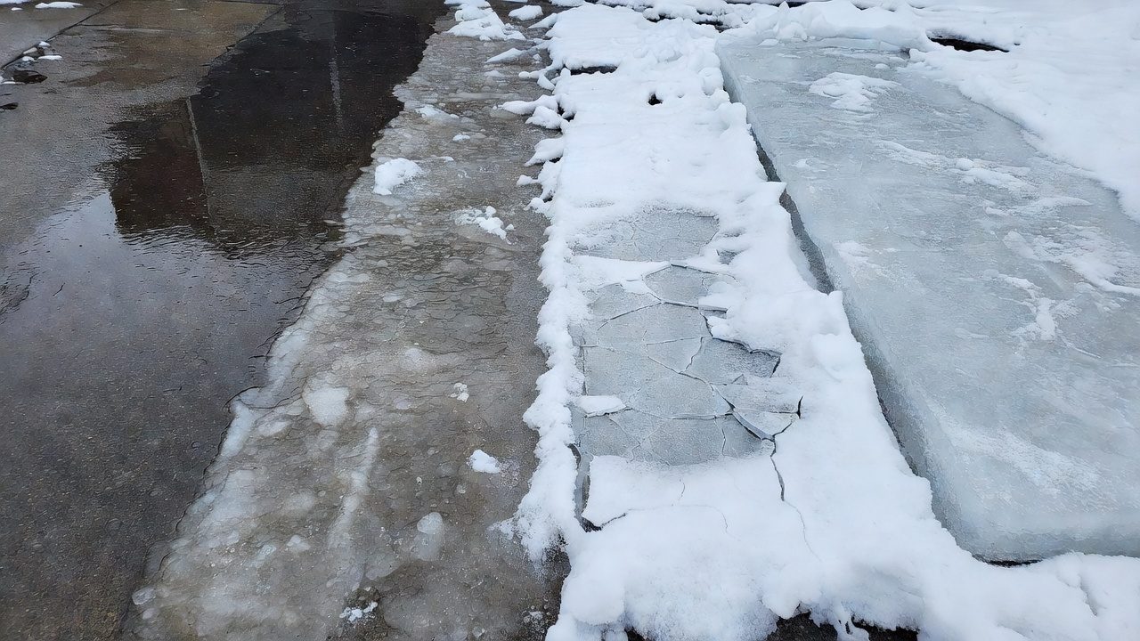 Do Snow Blowers Work On Ice: 2-Cycle Power Guide Four distinct winter surface textures on a concrete driveway showing black ice glaze, icy slush, snow with an ice crust, and a thick compacted ice sheet