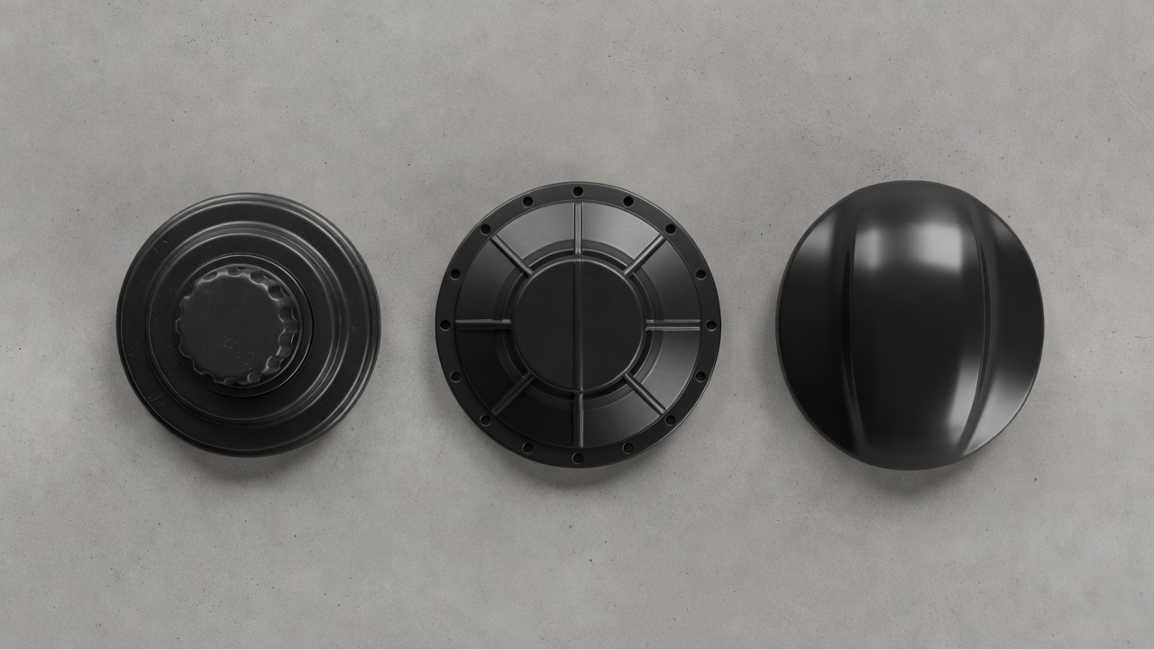 Three types of string trimmer heads — bump-feed, fixed-line, and auto-feed — displayed side by side on concrete